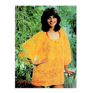 May include: A yellow crochet dress with a round neckline and three-quarter sleeves. The dress is crocheted in a delicate pattern and has a loose fit.