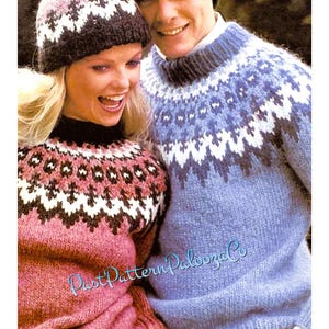 May include: A couple wearing matching knitted sweaters with a traditional Scandinavian pattern. The woman is wearing a matching knitted hat. The sweaters are blue and pink with white and black accents. The sweaters are made of 100% pure wool.