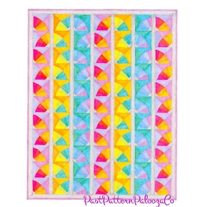 May include: A colorful quilt pattern with a repeating design of yellow, orange, red, pink, blue, and green fan shapes. The pattern is framed with a light pink border.