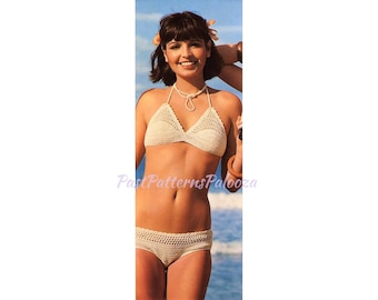 May include: A white crocheted bikini top and bottom. The top has a halter style with a white beaded necklace. The bottom is a high-waisted style.