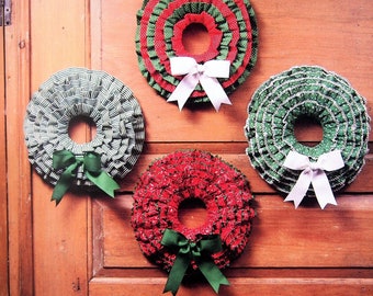 May include: Four handmade Christmas wreaths made of fabric with different colors and patterns. The wreaths are decorated with bows and are hanging on a wooden door. The text "PastPatternsPalooza" is visible at the top of the image.