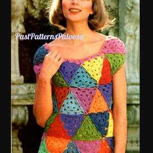May include: A colorful crochet top with a geometric pattern of triangles. The top has short sleeves and a scoop neck.
