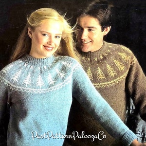 May include: A pair of knitted jumpers with a wintery design featuring stylised pine trees. The jumper on the left is light blue with white trees, while the jumper on the right is brown with gold trees.