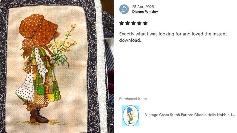 May include: A cross stitch pattern featuring a girl in a brown dress and a brown bonnet holding a bouquet of yellow flowers. The pattern is on a beige background with a black and white border.