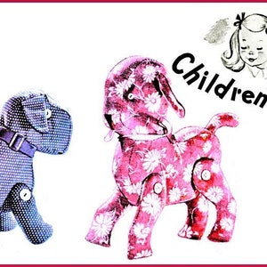 May include: Two plush toy dogs, one blue with a white collar and one pink with a floral pattern. The image is from a vintage children's magazine with the text "Children's Bazaar".