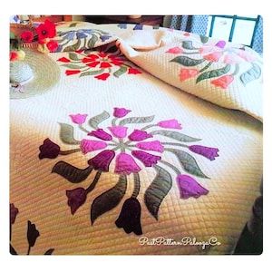 May include: A white quilt with a floral design featuring a large circle of purple, pink, and green tulips. The quilt is on a bed with a white sheet and a pillow. The text "Past Pattern Palooza Co." is visible in the bottom right corner.