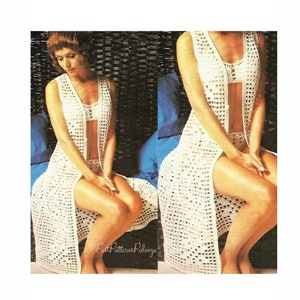 May include: A white crochet long vest with a deep V-neckline and a front opening. The vest is made with a lacy stitch pattern and has a long, flowing silhouette.