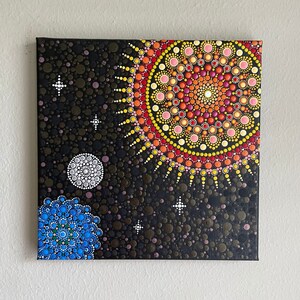 Cosmic Solar System Mandala Dot Painting with Sun, Earth, and Moon Motifs