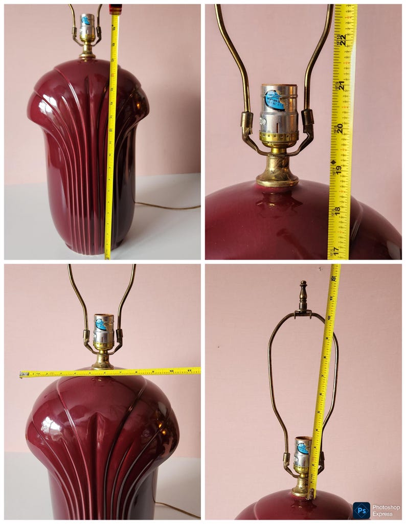 May include: A burgundy ceramic table lamp with a brass neck and a shade that is approximately 22 inches tall. The lamp has a fluted design and a classic, vintage aesthetic. The lamp is shown from multiple angles.