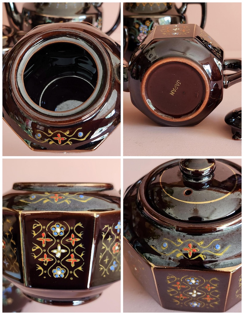 May include: A dark brown, octagonal tea set with gold trim and floral designs in red, blue, and white. The set includes a teapot and lid, showcasing a vintage aesthetic. The bottom of the teapot is marked "JAPAN".