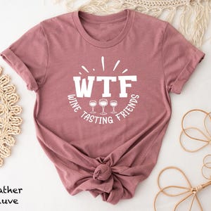 a women's t - shirt with the words wtf on it