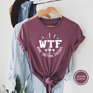 a t - shirt with a tie around the front of it
