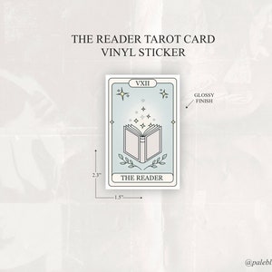 May include: A vinyl sticker featuring a tarot card design with a book and stars. The card is labelled "The Reader" and "VXII". The sticker is 2.3 inches tall and 1.5 inches wide. It has a glossy finish.