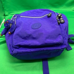 Handbags with monkey keyring top