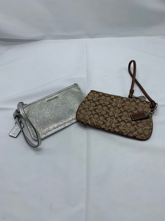 A pair of genuine Coach wristlets for day and nigh