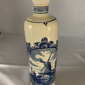 A vintage Delfts, Holland Liquor bottle with original stopper.