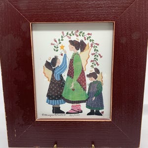 May include: A white ceramic mug with a black handle and the text "But First, Coffee" in a black, bold font. The mug is likely 11 ounces in size and sits on a white surface.