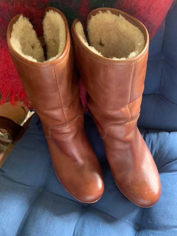 A handsome pair of brown leather UGG boots in size