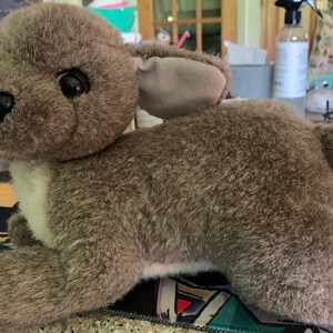 A vintage stuffed animal, “Scrappy”, the dog, from Applause.