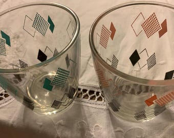 A pair of same design mid-century glasses.