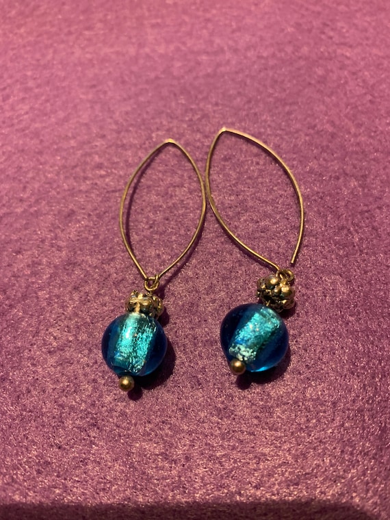 A pair of blue bead and silver wire earrings. - image 1