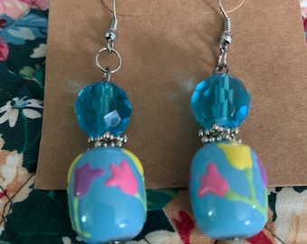 A pair of fun, funky summer pierced earrings in blues, pinks and yellow.
