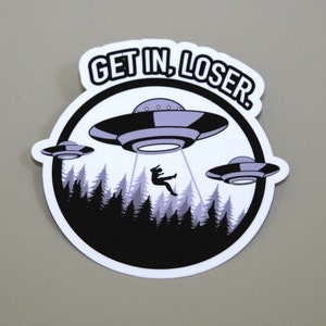 UFO Alien Funny Sticker, PREMIUM Quality, Laminated, Glossy Finish, Weatherproof, Waterproof, U.V Protection