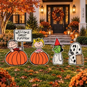 May include: Four outdoor yard decorations featuring Peanuts characters: a boy on a pumpkin holding a sign that reads WELCOME GREAT PUMPKIN, a girl on a pumpkin, a green-skinned witch in a red hat, and a ghost figure holding a brown bag.