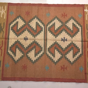 Handwoven Wool Jute Area Rug: Bohemian Kilim Design