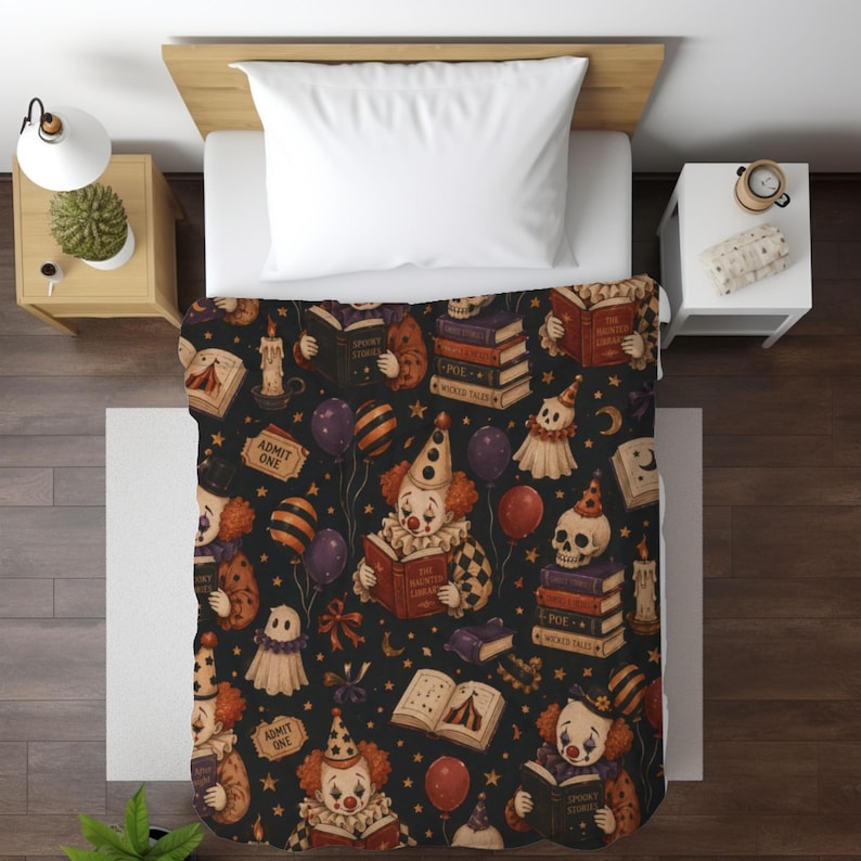 Vintage Halloween clown reading blanket with red‑haired clowns holding spooky books, skulls, candles, tickets, ghosts, stars, and balloons on a black background; available in ultra‑plush sherpa or smooth velveteen styles and in 50x60 and 60x80 inch sizes