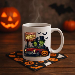 Haunted Motel 6 Halloween Coffee Mug – Retro Witch & Goblin Driving Scene – Spooky Cute 11oz Mug for Fall Vibes