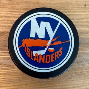 Vintage New York Islanders NHL hockey puck