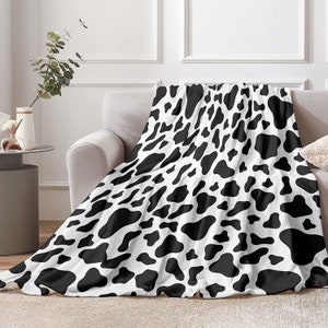 Cow print throw blanket best sale