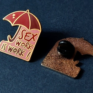 Sex work is work feminist pin in gold metallic enamel with red umbrella LGBT and feminist pride