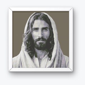 May include: A black and white portrait of Jesus Christ with long hair and a beard. He is wearing a white robe and has a gentle expression on his face.