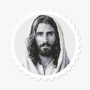 May include: A black and white portrait of Jesus Christ with long hair and a beard, wearing a white robe. The image is in a circular frame with a scalloped edge.