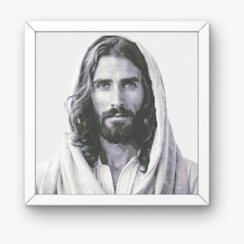 May include: A black and white portrait of Jesus Christ with long hair and a beard. He is wearing a white robe and has a gentle expression on his face.