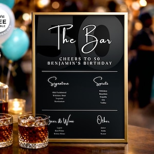 May include: A black and gold framed bar menu for a 50th birthday celebration. The menu lists signature cocktails, spirits, beers, wines, and other beverages. The text reads "The Bar" and "Cheers to 50 Benjamin's Birthday".