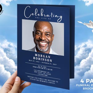 May include: A navy blue 4-page funeral program brochure. The cover features a photo of a smiling man, the text "Celebrating the Life of" and the name "Morgan Robinson". A white dove flies in the background.