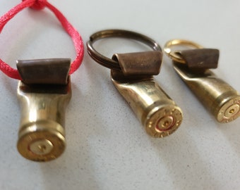 Key ring key chain, real authentic once fired bullet shell key ring, zipper pull, pendant. Hand made ,recycled in a zero waist work shop.