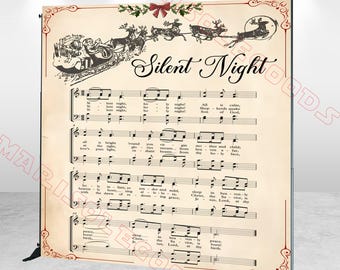 May include: A large, vintage-style Christmas backdrop featuring the sheet music for "Silent Night." The design includes illustrations of Santa's sleigh and reindeer, with decorative borders and the text "Silent Night."