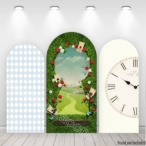 May include: Three arched backdrop panels for a photo booth. The center panel features a green, leafy archway with a keyhole opening to a whimsical landscape. The left panel is a blue and white checkered pattern. The right panel is white with a large clock face.