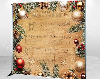 May include: A Christmas-themed backdrop featuring sheet music with the words "Jingle Bells." The backdrop is decorated with ornaments, pine needles, pine cones, and berries. The text "Stand not included" is at the bottom.
