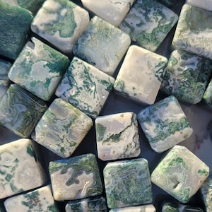 Large carved moss agate cubes