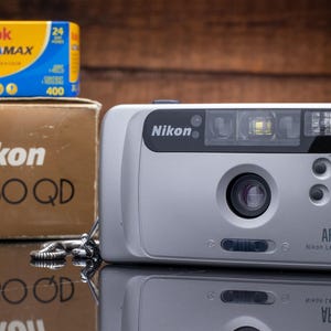 Nikon AF 230 QD Autofocus Compact Point and Shoot Film Camera in Working cond.from  1990s Lomography - Camera Collectors Gift + case + box