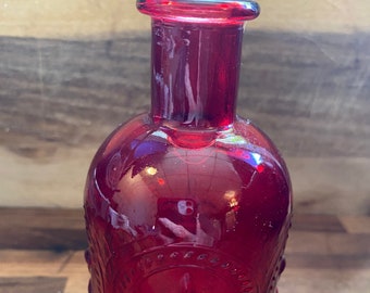 Short bottle neck deep cranberry red fleur d’lis glass vase