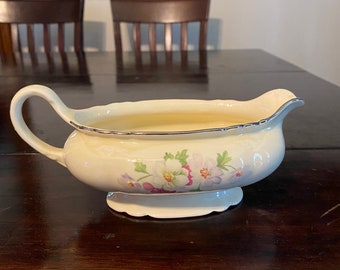 Vintage Virginia Rose pattern gravy boat serving dish with gold rim.