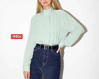 VINTAGE pastel green womens blouse with a stand-up collar and pleats at the front from 1980s | retro style