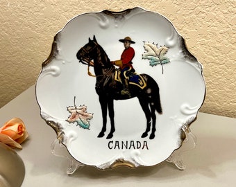 Canada Gold Trim Collector Plate Made in Japan with Mounted Police on Black Horse and Sparkle Leaves