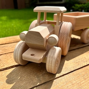 Handmade natural wooden tractor
